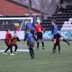 Young footballers battle for international fixture
