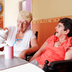 carer pouring a cup of tea
