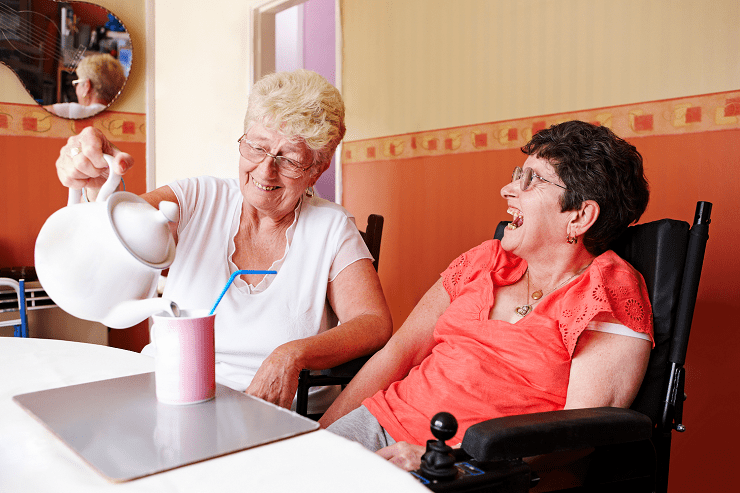 carer pouring a cup of tea