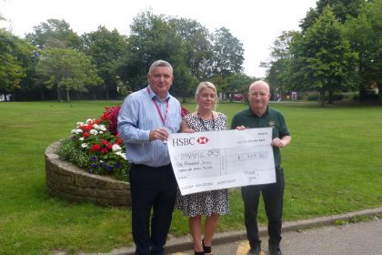 Dynamic receives big cheque after three-peaks challenge