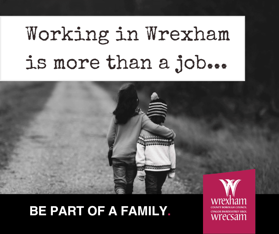 Image shows two young children walking up a dusty track. The text on the image says: "Working in Wrexham is more than a job. Be part of a family."