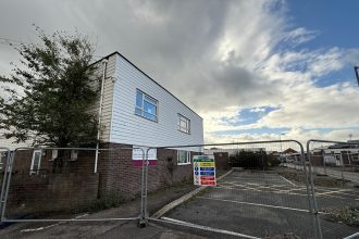 building with fencing surrounding