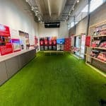 Wide shot of Wrexham AFC exhibition in the gallery space at ty pawb