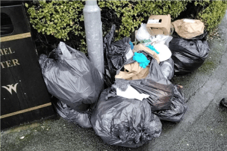 Fly-tipping next to public litter bins