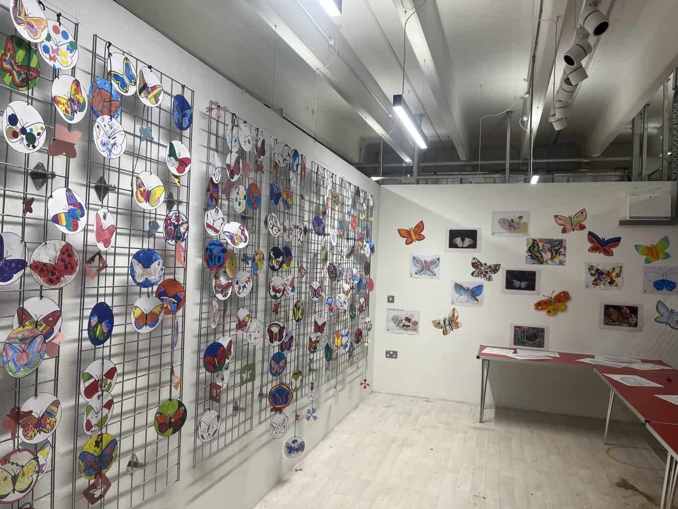 Butterfly trail entries displayed at Tŷ Pawb