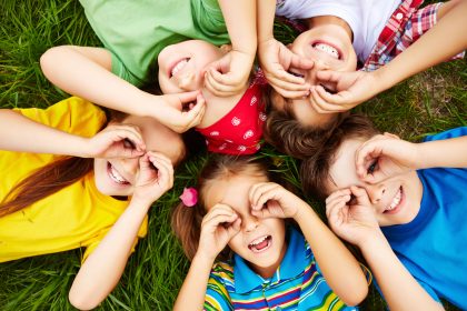 Specialist Children's Centre - children playing in the grass