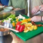 Demonstration of chopping fruit and vegetables at a cooking class