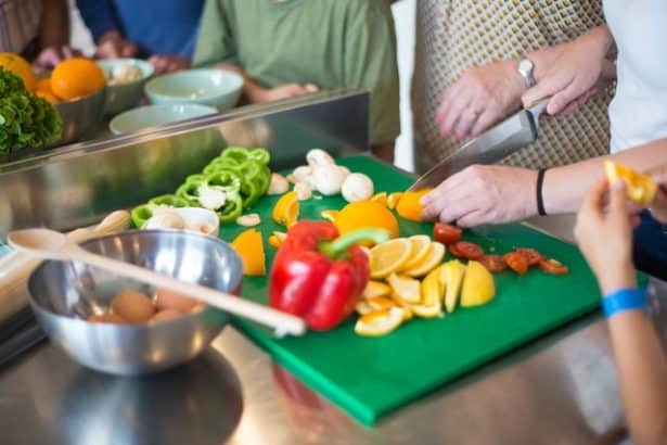 Demonstration of chopping fruit and vegetables at a cooking class