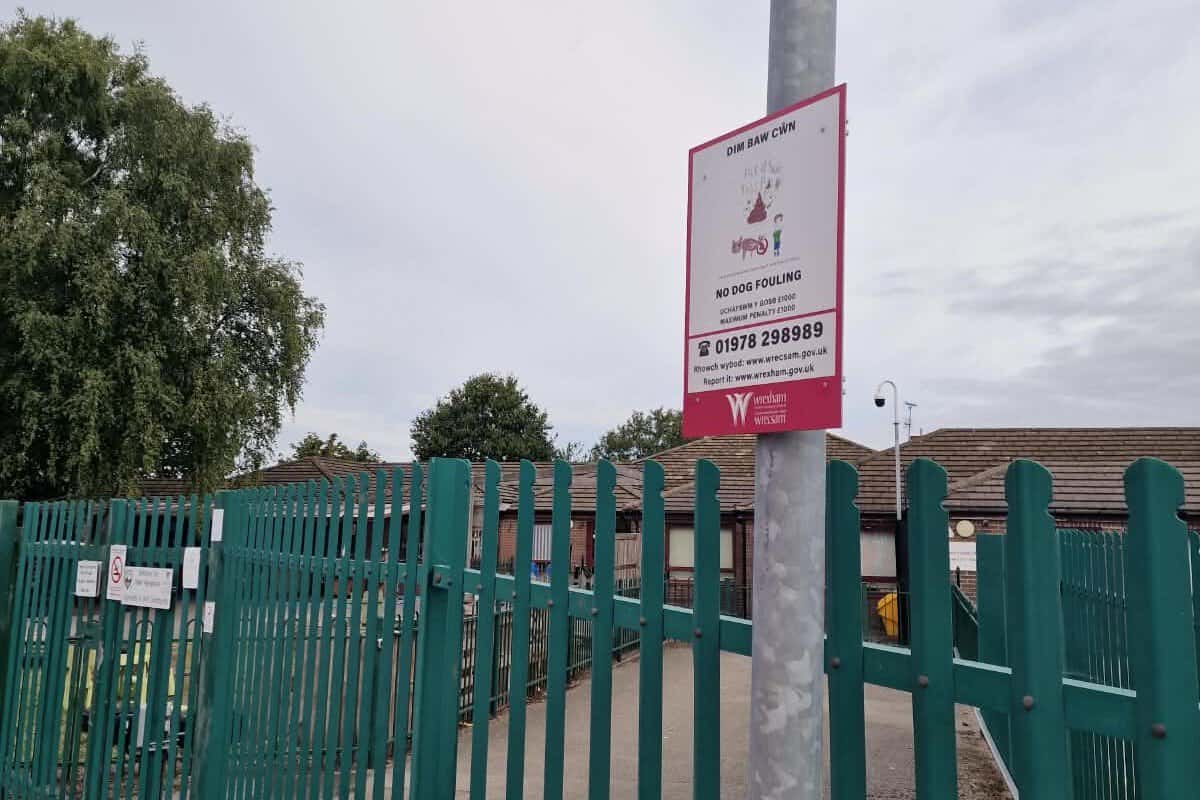 Young designers anti-dog fouling signs begin appearing across Wrexham