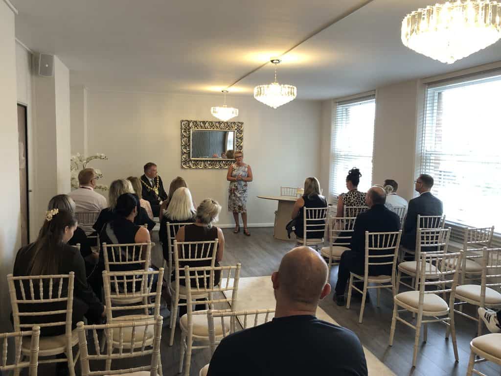 Staff attending the reopening of the ceremony room in the Guildhall