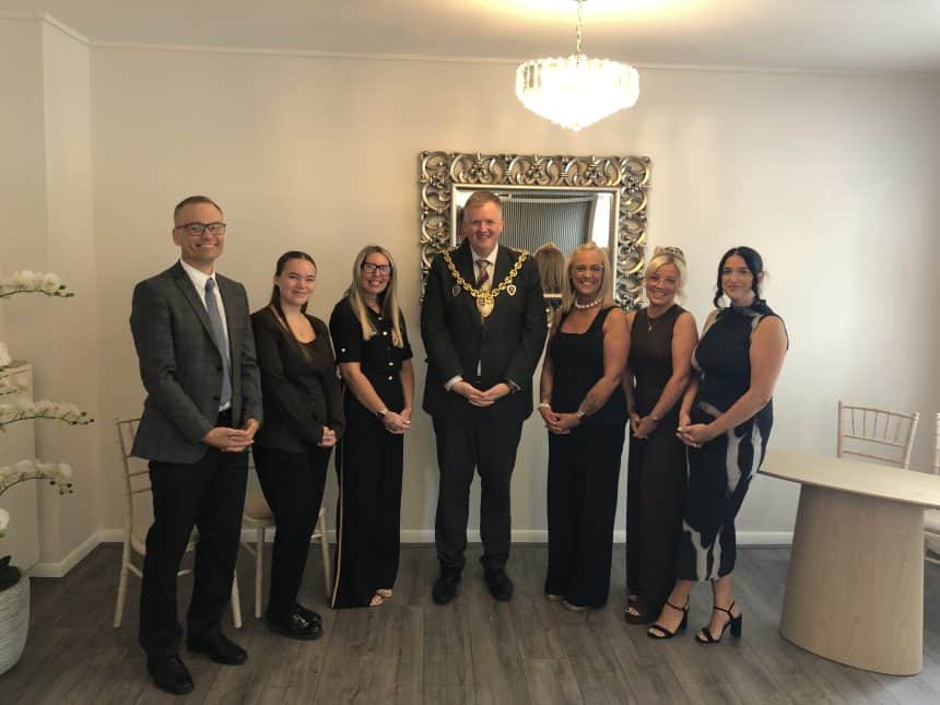 Mayor with the Registrar team